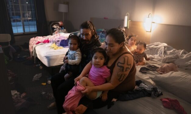 For Western Alaska evacuees, life in Anchorage hotels brings new routines and new strains
