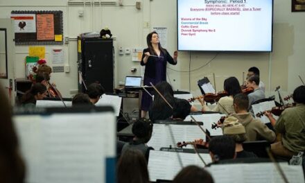 Playing it forward: Anchorage musician’s gift transforms high school orchestra